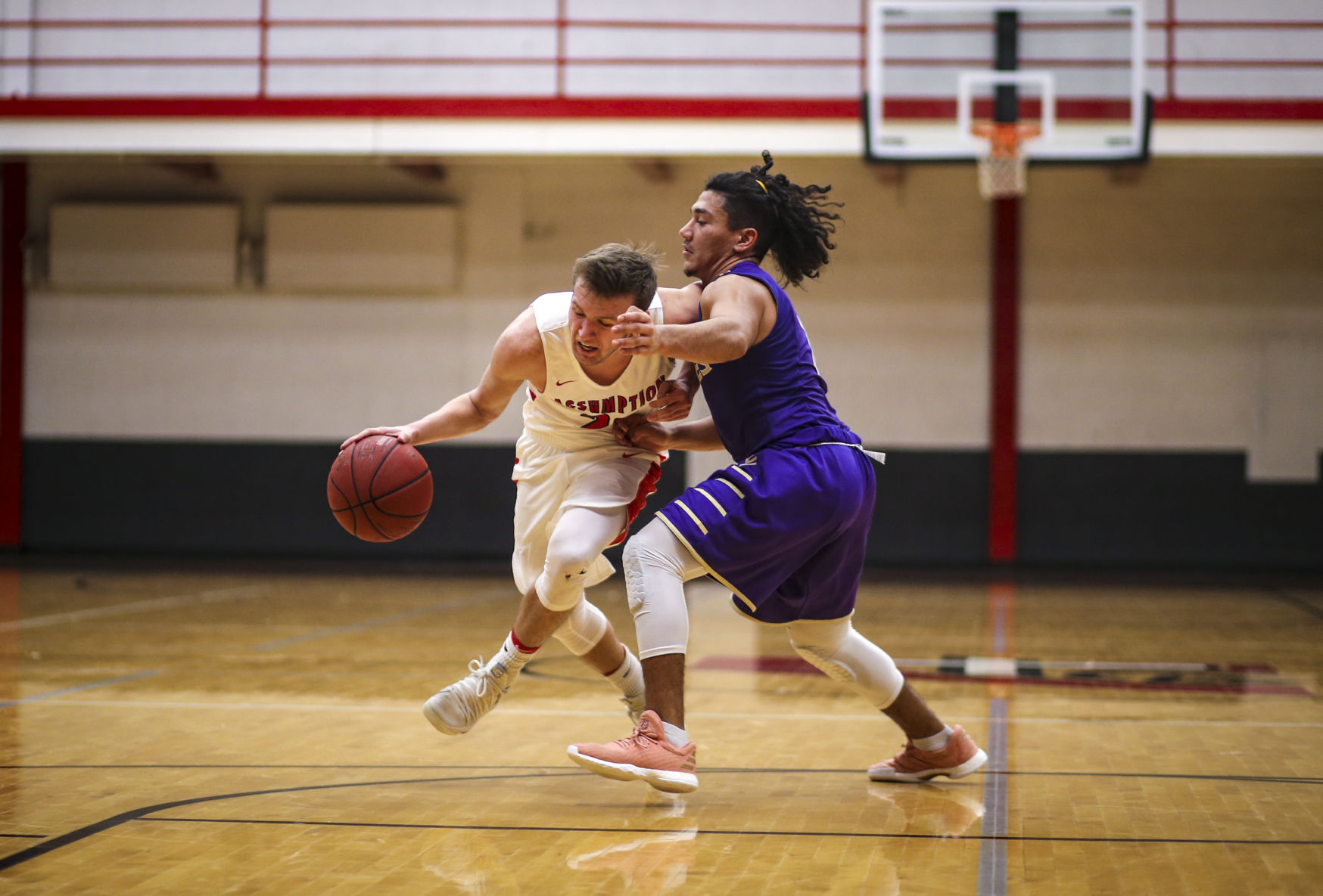 010918-MUSCATINE-ASSUMPTION-BASKETBALL-002